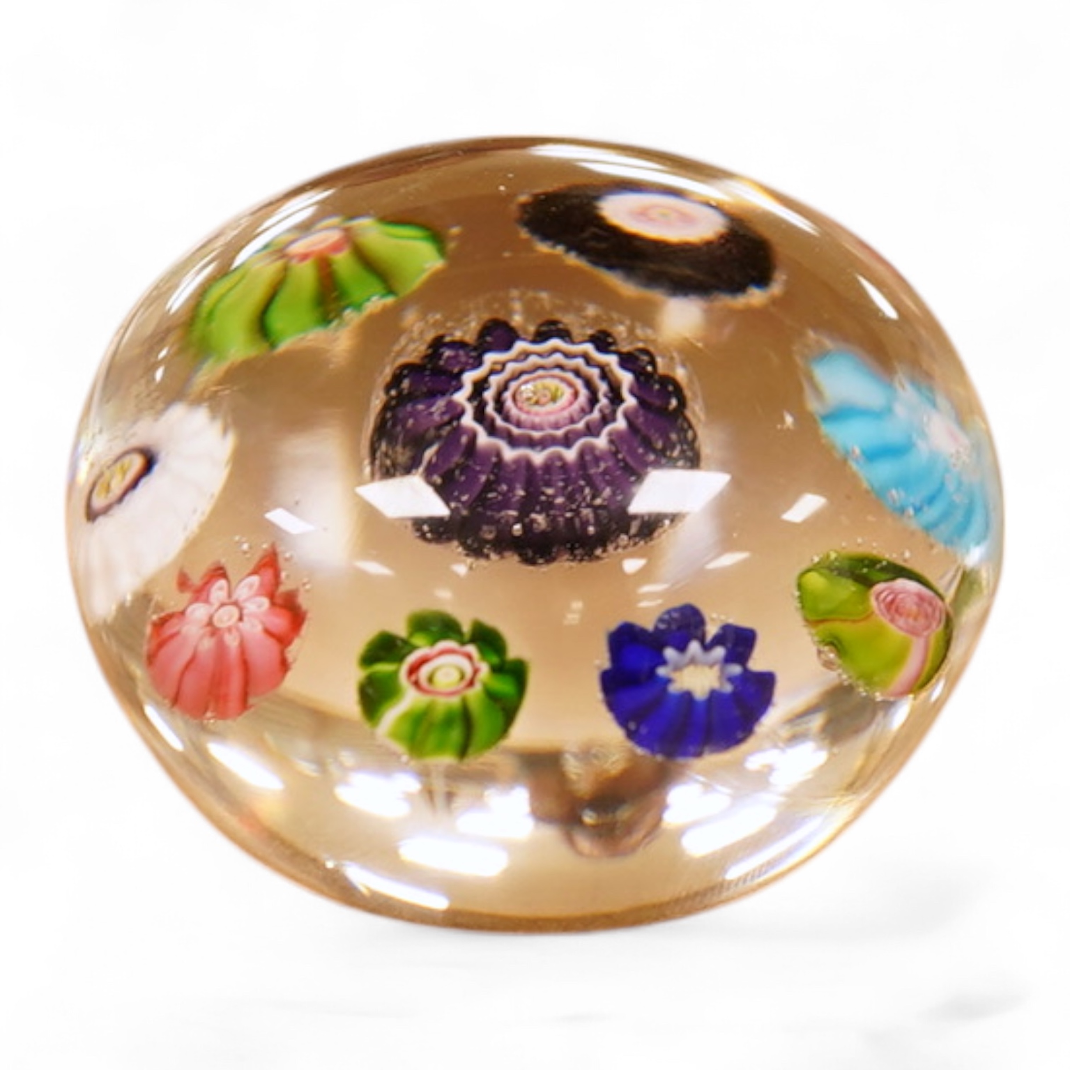 A small Clichy millefiori glass paperweight, 4cm in diameter